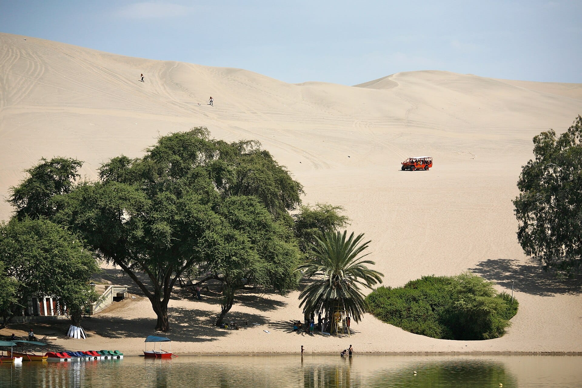 Sandboarding the dunes of Huacachina, Peru