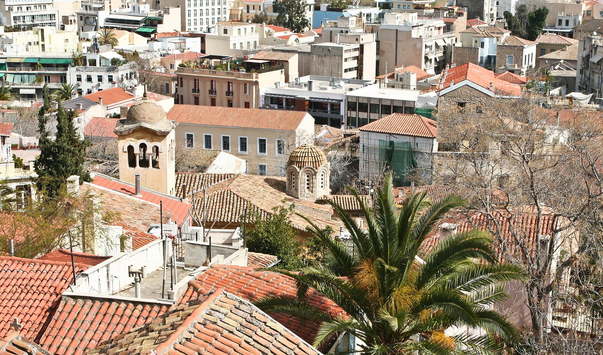 The Acropolis rising above the rooftops of Athens