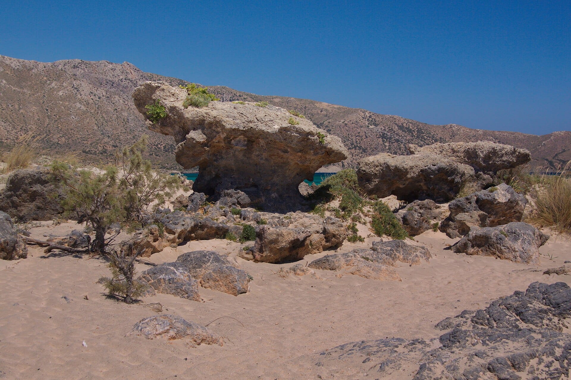 The pink-tinted sand and shallow turquoise lagoon of Elafonissi