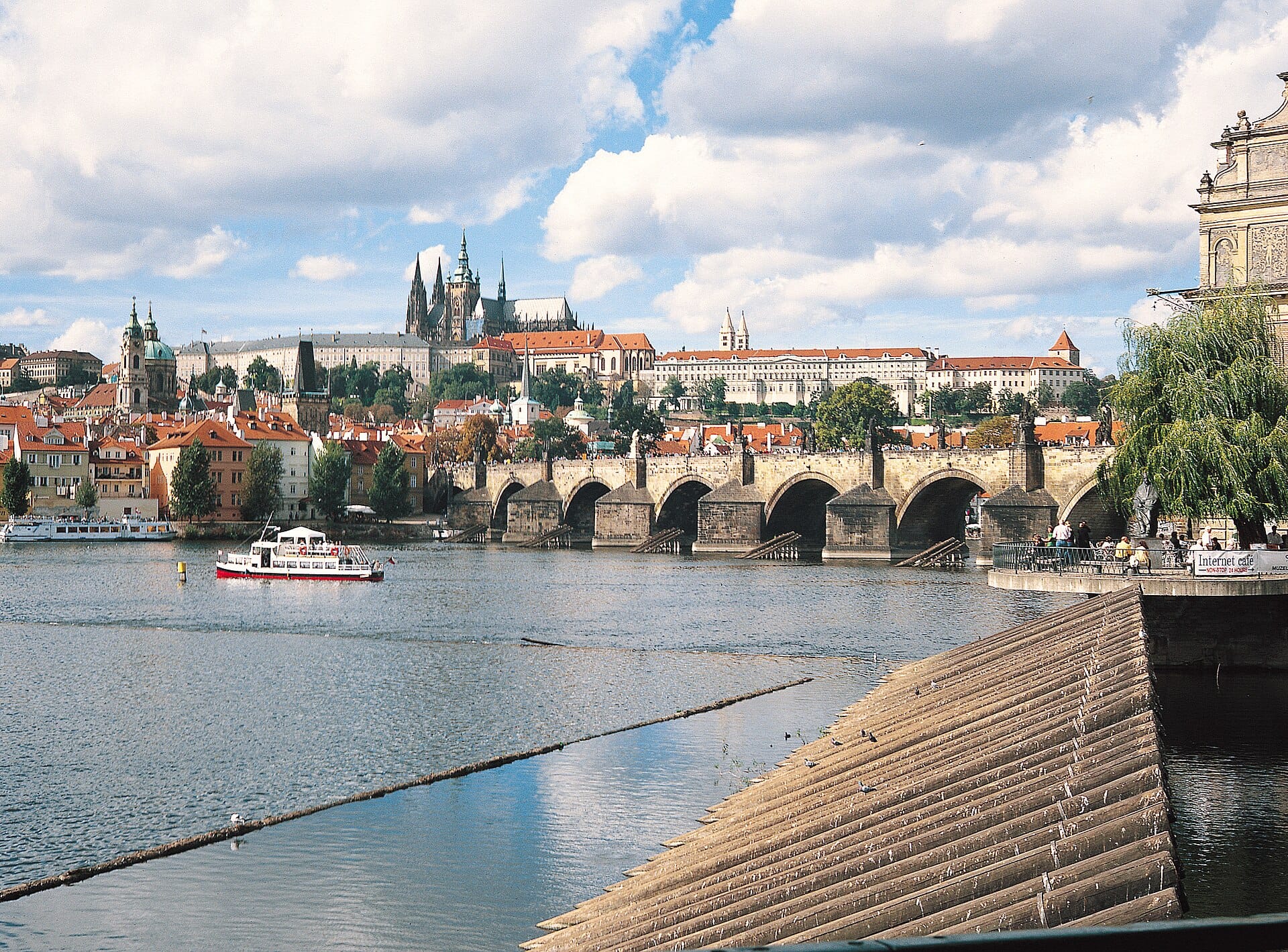 Prague Castle and St Vitus Cathedral rising above Charles Bridge and the Vltava